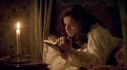 Catherine Moreland reads a horrid novel by candlelight - the better to stir up her dreams. Felicity Jones in the ITV production of Northanger Abbey, 2007.